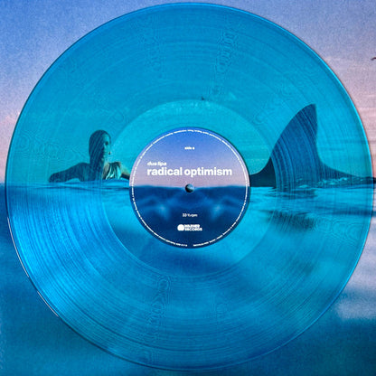 DUA LIPA - RADICAL OPTIMISM LIMITED EDITION Curaçao Blue LP